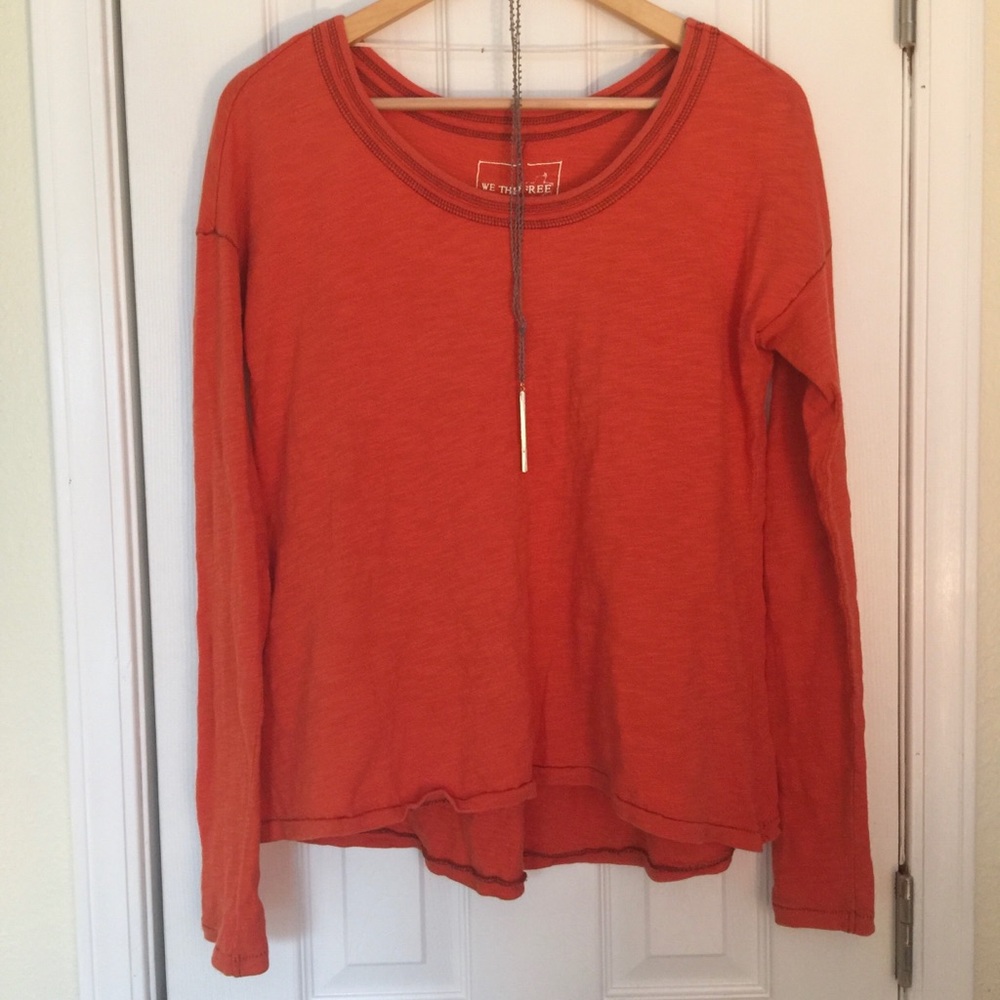 Vivid orange Free People long sleeved top